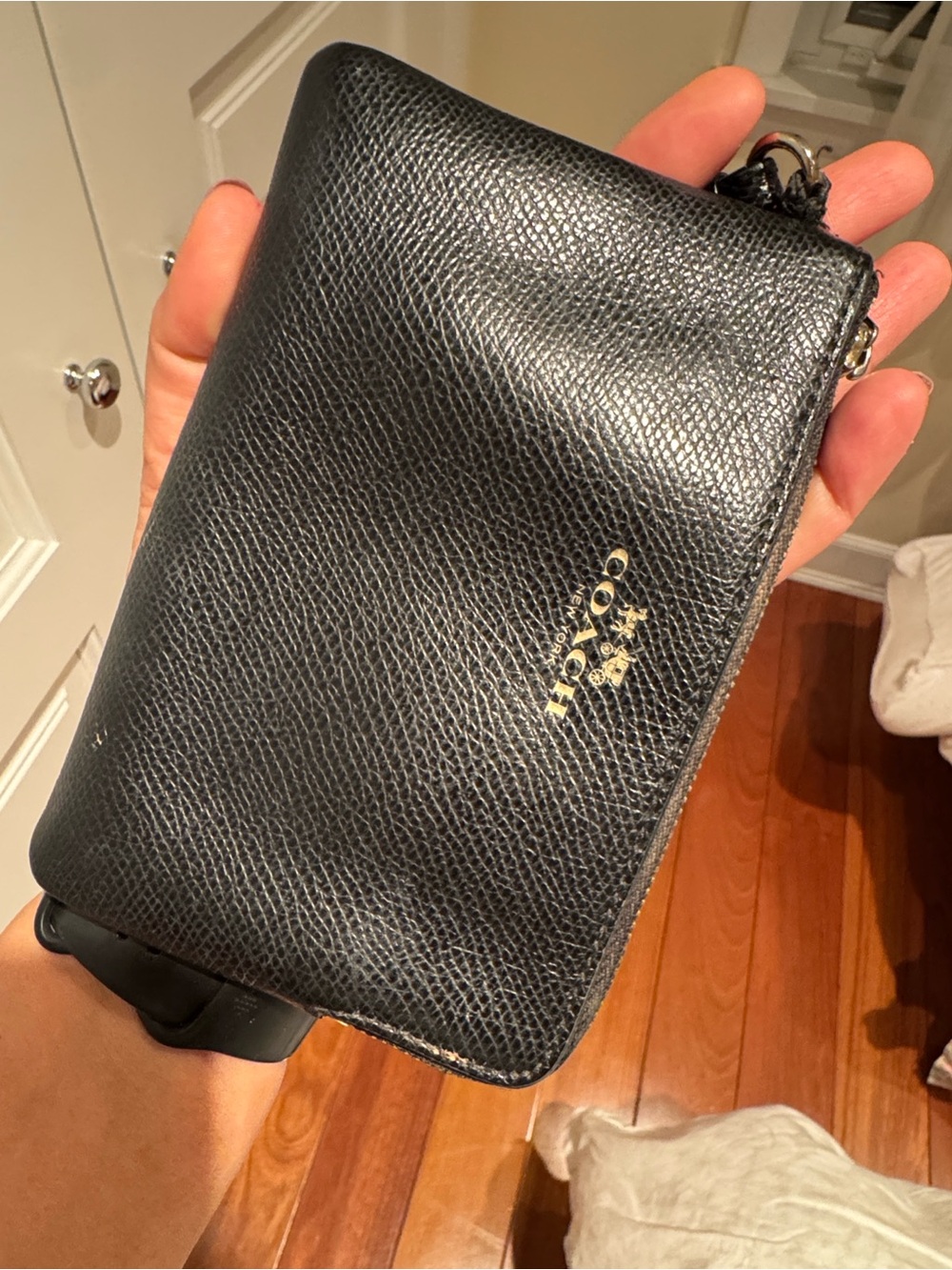 Coach Black Pebbled Leather Wrist Wallet with Gold Logo